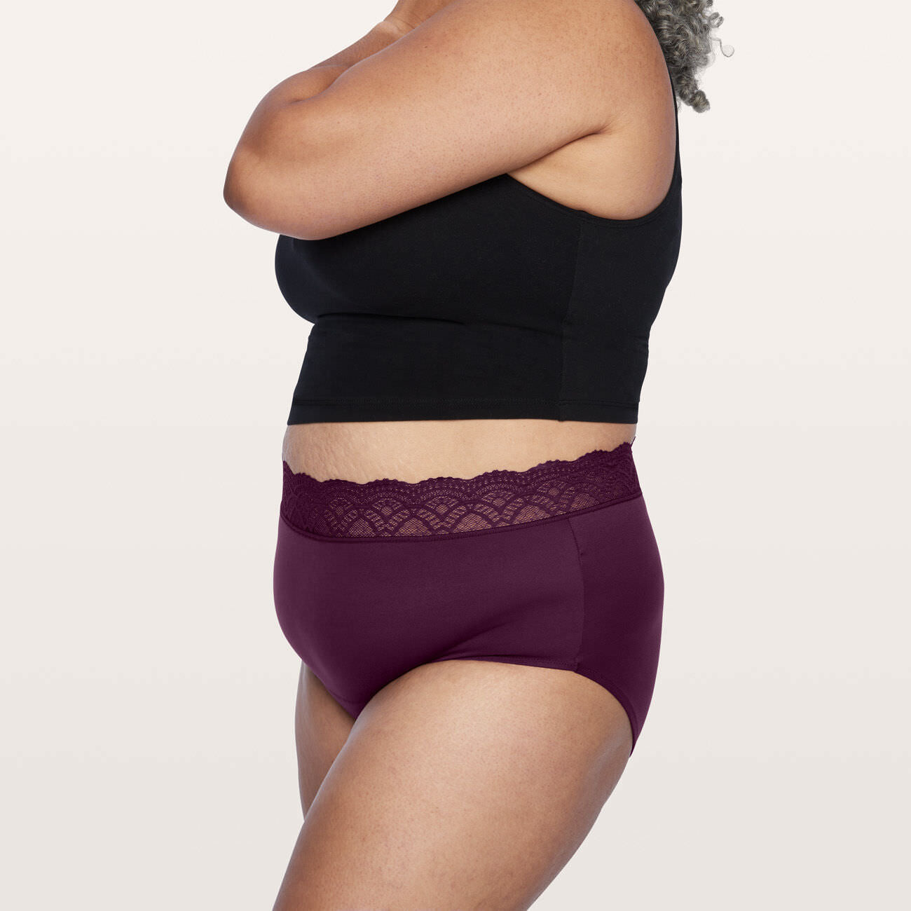 side view of lace hiwaist bladder leak underwear in purple