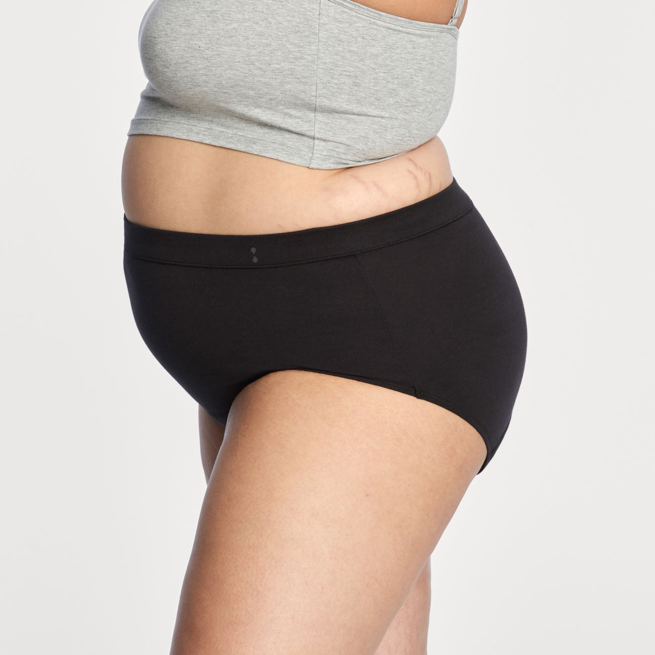 side view of thinx everyday comfort hiwaist in black